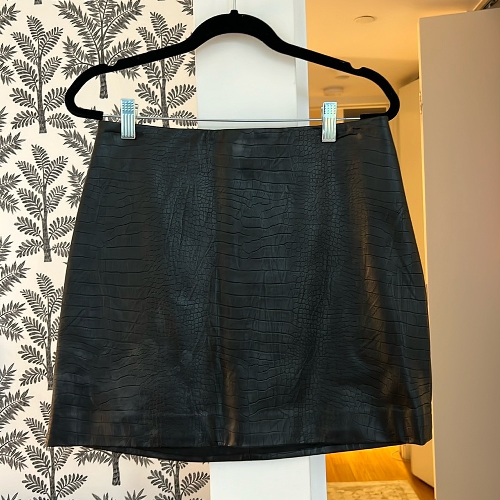 Black leather mini skirt